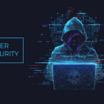 man sitting with laptop