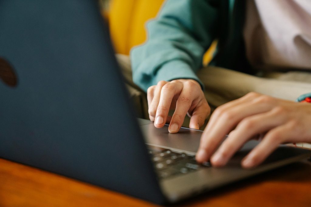 Person using laptop for online work or study