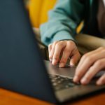 Person using laptop for online work or study